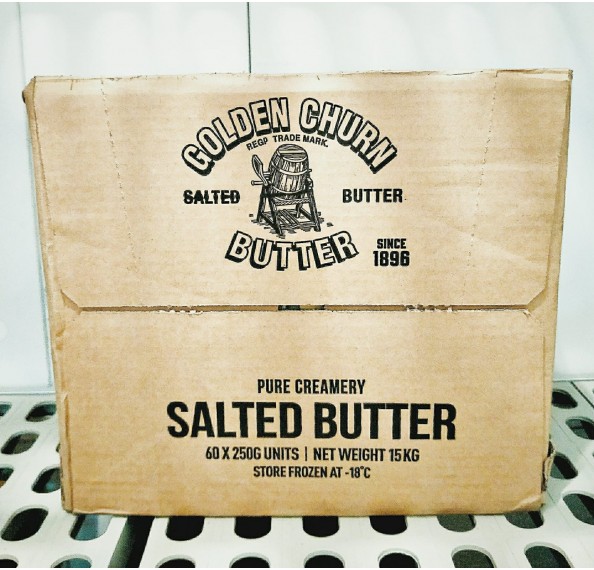 Golden churn butter